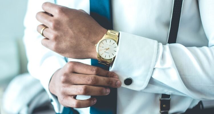 person wearing white dress shirt
