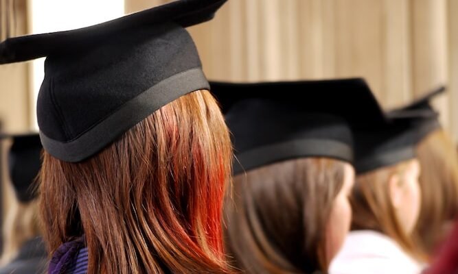 women on square academic caps